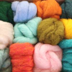 photograph shows carded wool in lots of bright colours