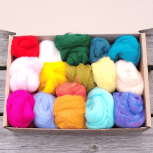 Lots of brightly coloured carded needle felting wool to use for needle felting projects.