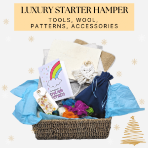 A seagrass hamper full of needle felting wool, tools and acessories. Text reads: luxury starter hamper