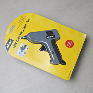 Image shows a mini glue gun. Useful for lots of crafting products.