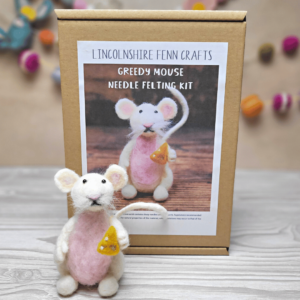Cute needle felted mouse eating a piece of cheese